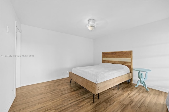 bedroom featuring ceiling fan and light wood-type flooring