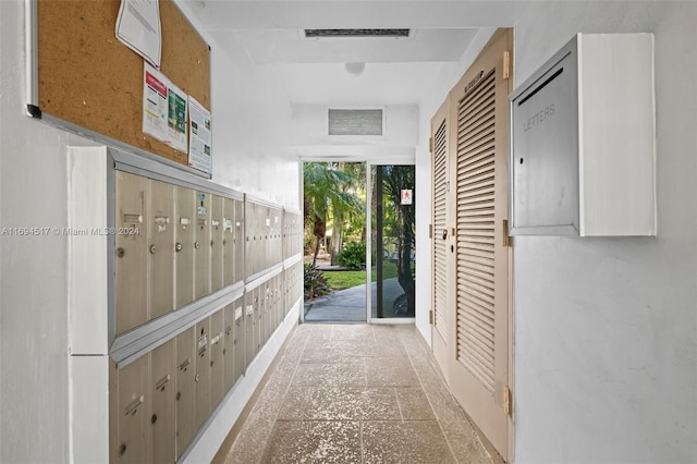 hallway with mail boxes