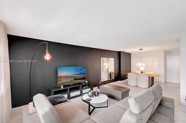 living room with light tile patterned floors