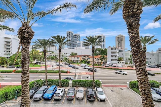 6770 Indian Creek Dr Unit 4R, Miami Beach, FL 33141 - view of property with uncovered parking and a view of city