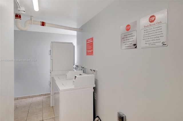 washroom featuring light tile patterned floors and hookup for a washing machine