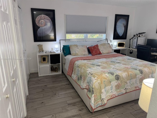 bedroom with light hardwood / wood-style flooring