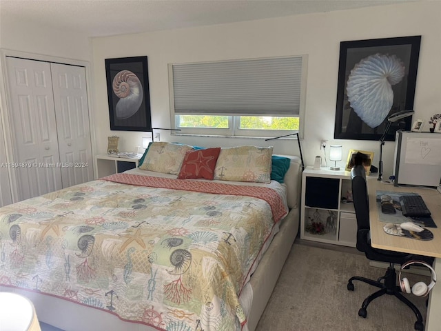 bedroom featuring light carpet and a closet