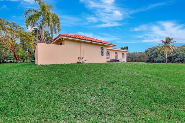 exterior space with a lawn