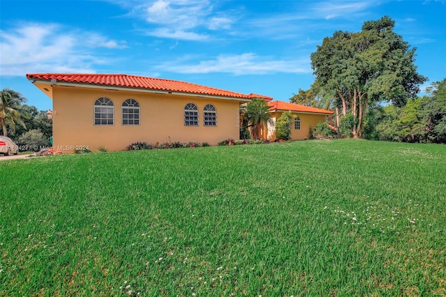 exterior space featuring a yard