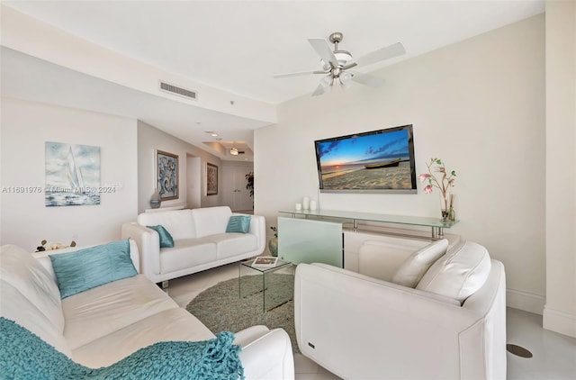 living room featuring ceiling fan