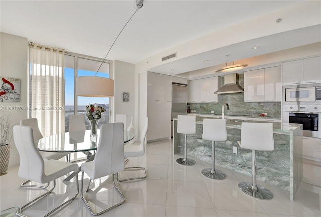 view of tiled dining area