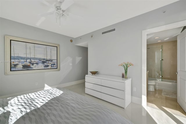 bedroom featuring ensuite bath, ceiling fan, and light tile patterned floors