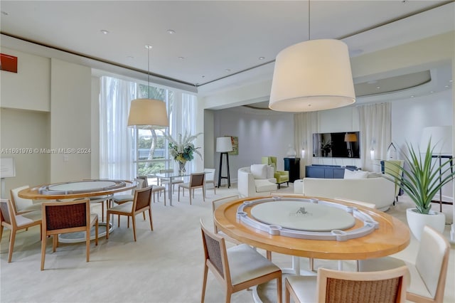 dining area with light carpet