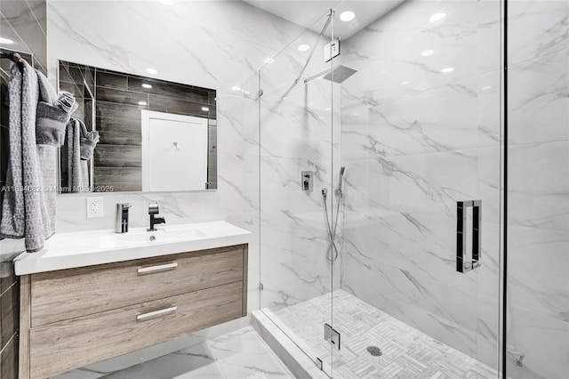 bathroom featuring vanity and walk in shower