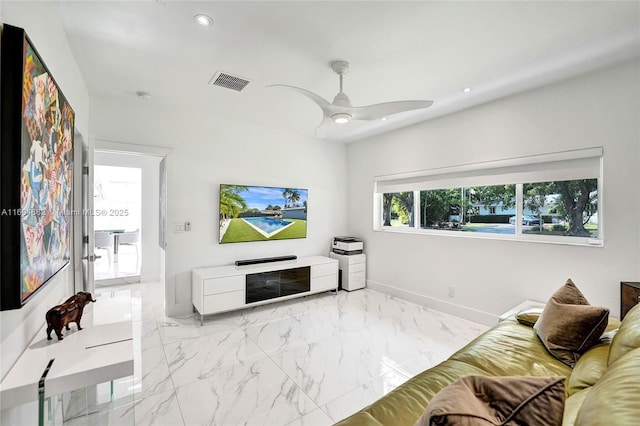 living room with ceiling fan