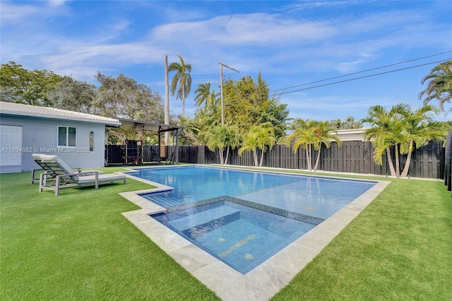 view of swimming pool featuring an in ground hot tub, a yard, and a pergola