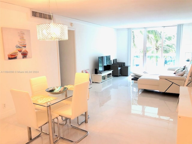 dining area with expansive windows