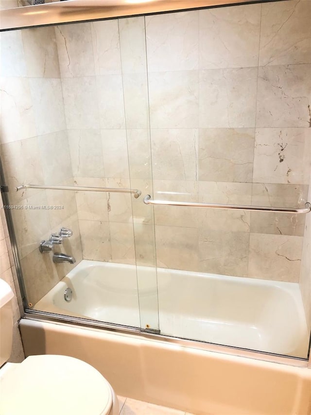 3901 S Ocean Dr Unit 2J, Hollywood, FL 33019 - full bathroom with toilet and enclosed tub / shower combo