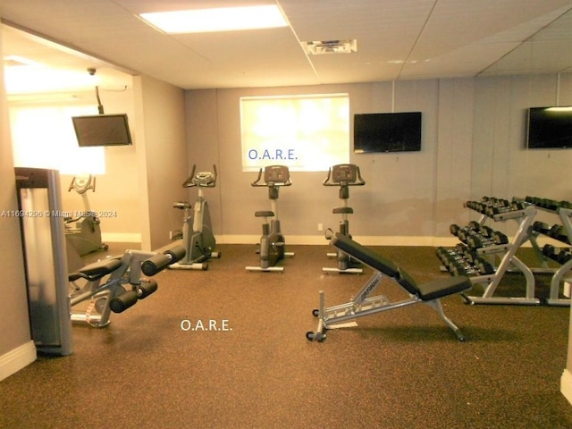 3901 S Ocean Dr Unit 2J, Hollywood, FL 33019 - workout area featuring baseboards