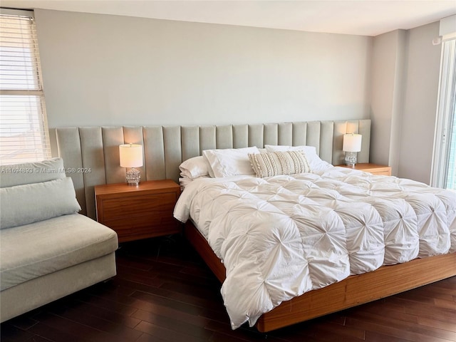 bedroom featuring dark hardwood / wood-style flooring