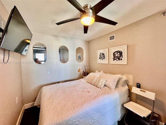 bedroom featuring ceiling fan