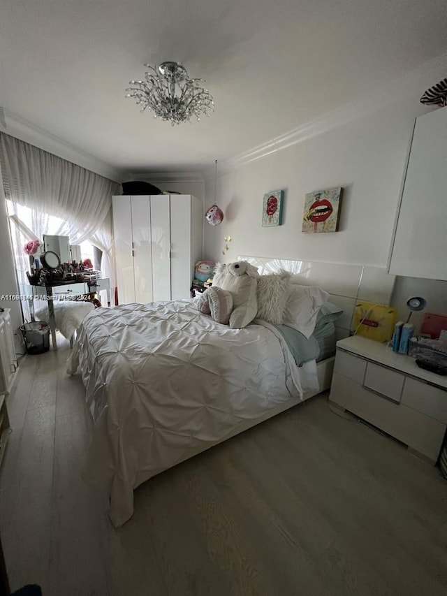 bedroom featuring hardwood / wood-style flooring