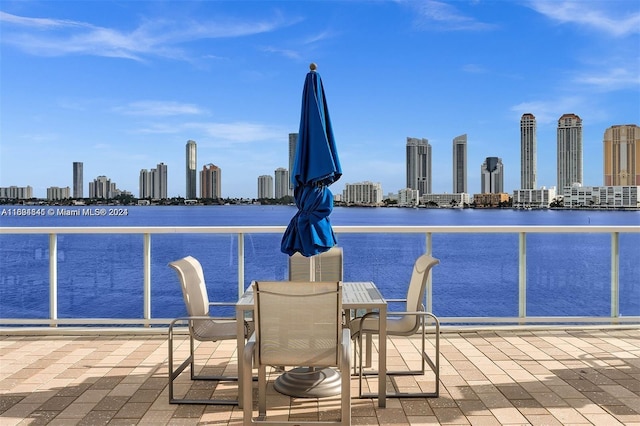 view of swimming pool featuring a water view