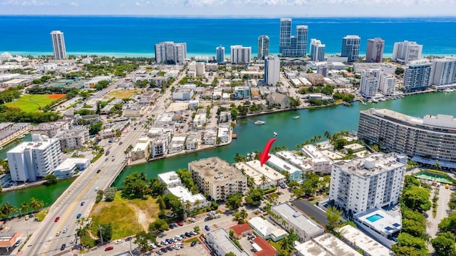 drone / aerial view with a water view