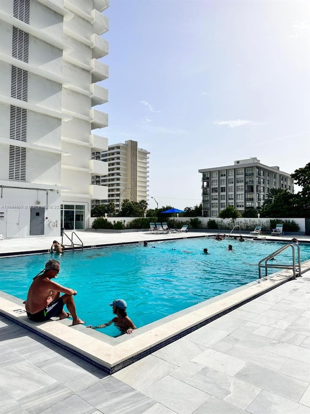 view of pool with a patio area