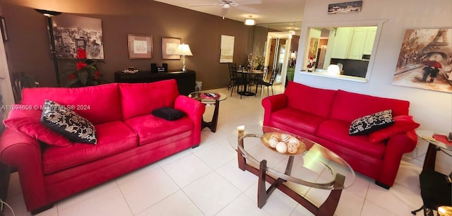 living room with light tile patterned floors and ceiling fan