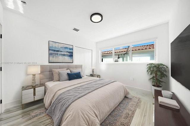 bedroom featuring hardwood / wood-style flooring