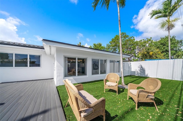 deck featuring a yard