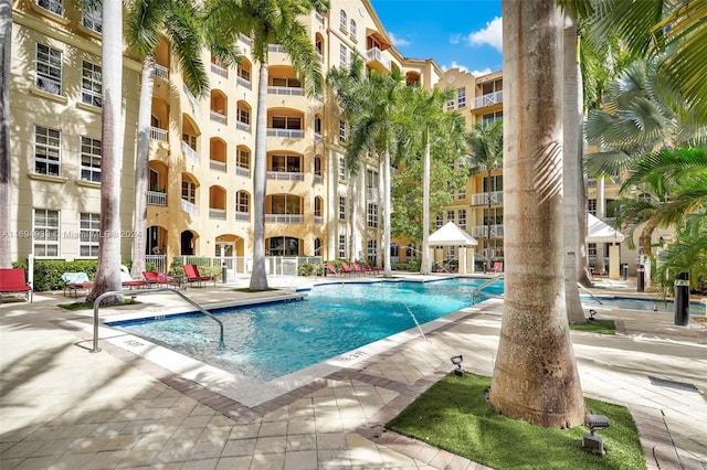 view of swimming pool with a patio area