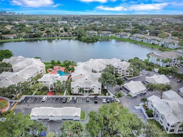 birds eye view of property featuring a water view