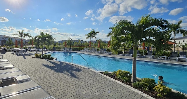 view of swimming pool featuring a patio