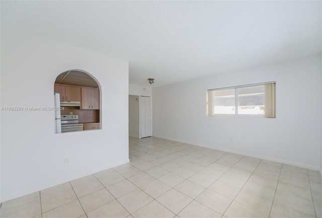 view of tiled spare room