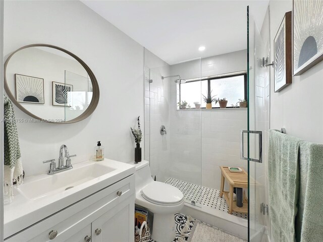 8415 SW 107th Ave Unit 356W, Miami, FL 33173 - bathroom featuring a stall shower, vanity, and toilet