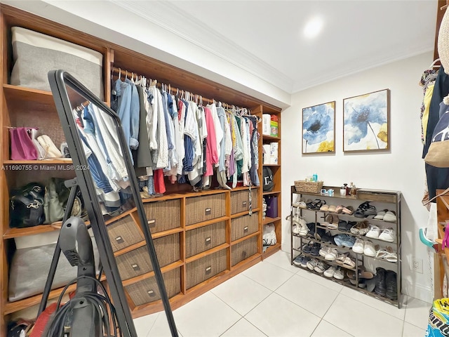 spacious closet with tile patterned floors