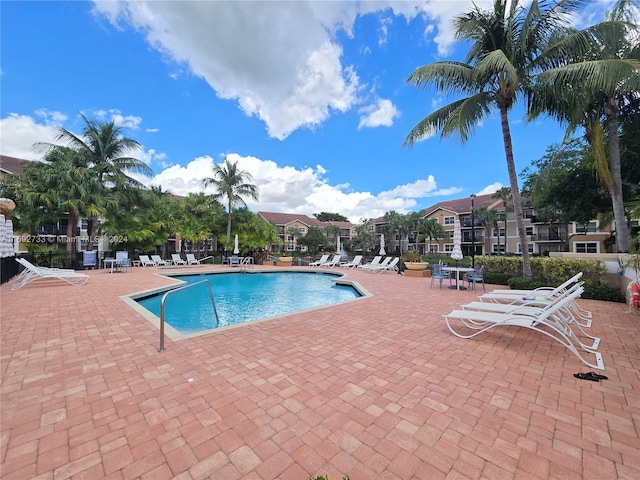 view of pool featuring a patio