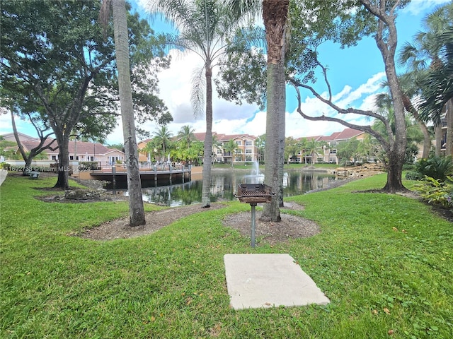 view of yard with a water view