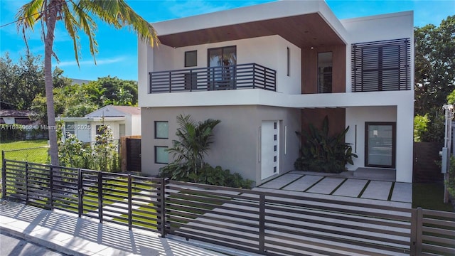 contemporary house featuring a balcony