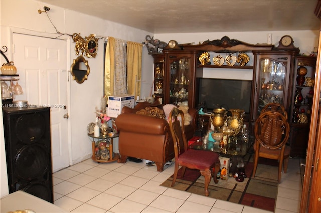 sitting room featuring light tile patterned floors