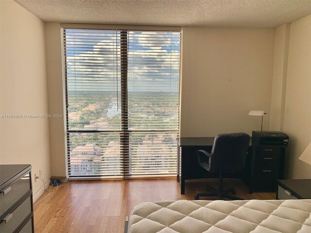 1500 S Ocean Dr Unit 17E, Hollywood, FL 33019 - office with a textured ceiling, wood finished floors, and plenty of natural light