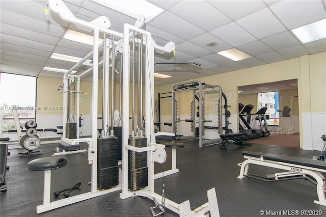 gym featuring a drop ceiling