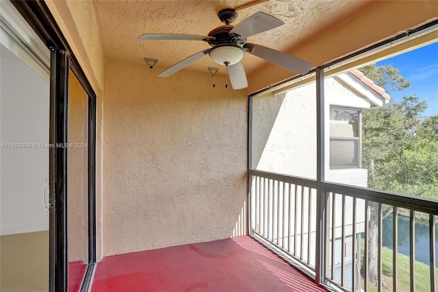 balcony featuring ceiling fan