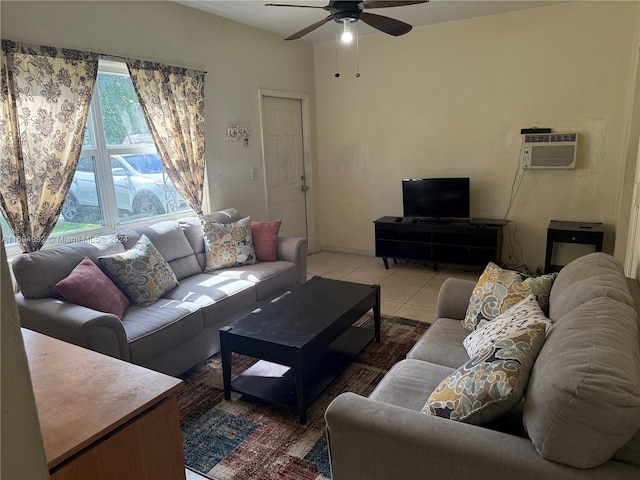 living room featuring an AC wall unit, ceiling fan, and light tile patterned flooring