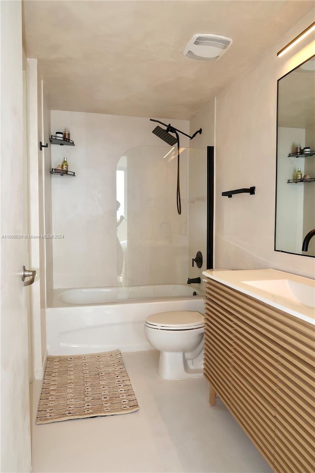 full bathroom with vanity, toilet, and tiled shower / bath