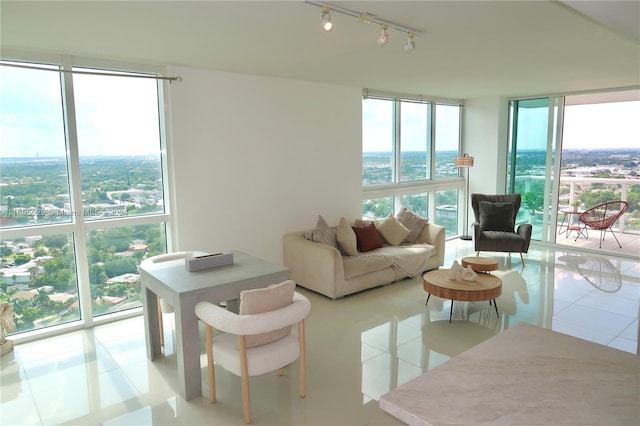 tiled living room featuring expansive windows