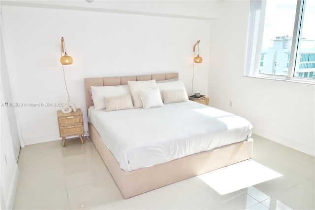 1861 NW S River Dr Unit 2505, Miami, FL 33125 - bedroom featuring baseboards and light tile patterned floors