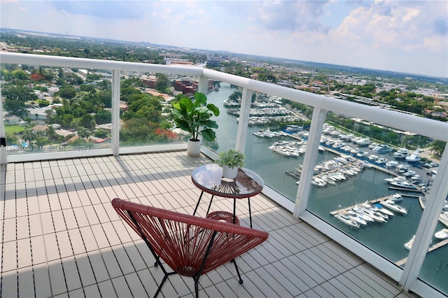 balcony featuring a water view