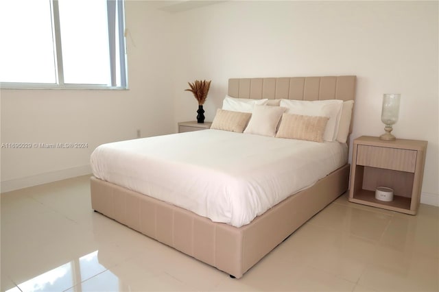 bedroom featuring tile patterned floors