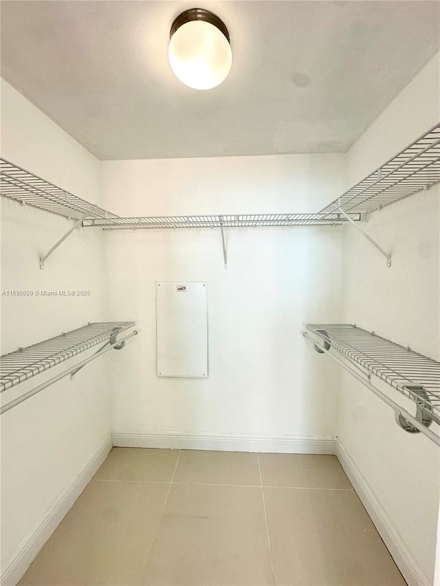 1861 NW S River Dr Unit 2505, Miami, FL 33125 - spacious closet with light tile patterned flooring