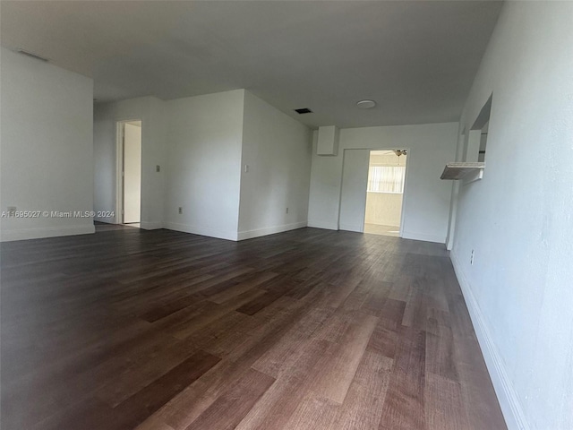 interior space featuring dark wood-type flooring