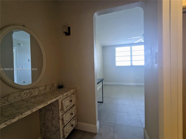 bathroom featuring tile patterned flooring